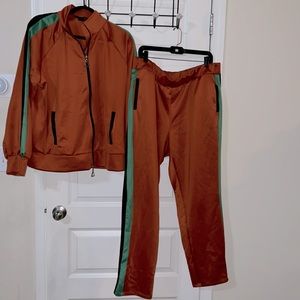 2pc jogger set from Ashley Stewart. Straight leg w/pockets double zipper jacket